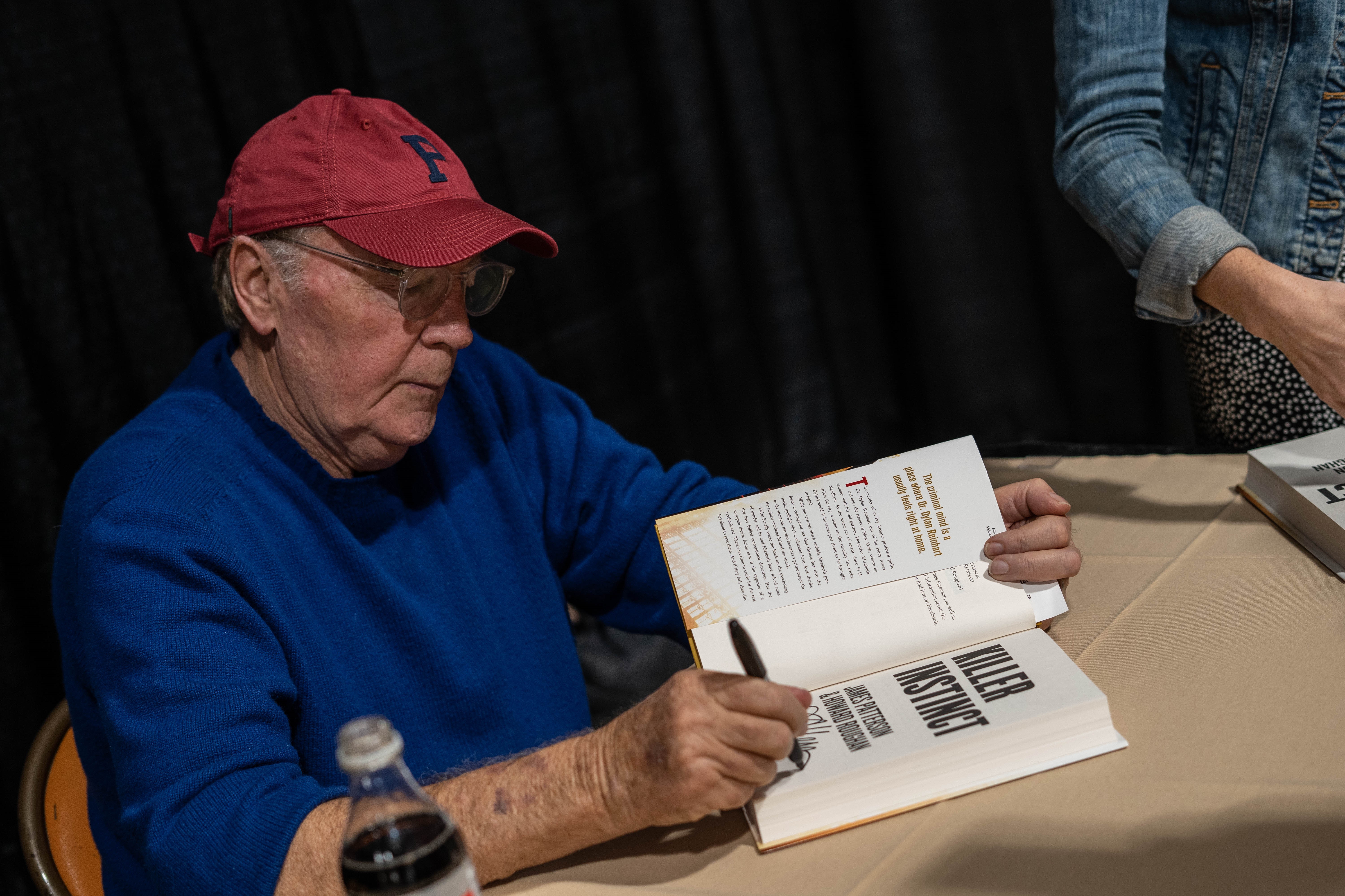 James Patterson signing book