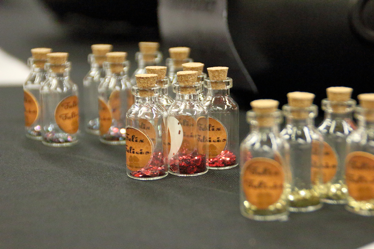 Small corked bottles with glitter inside labelled as various potions