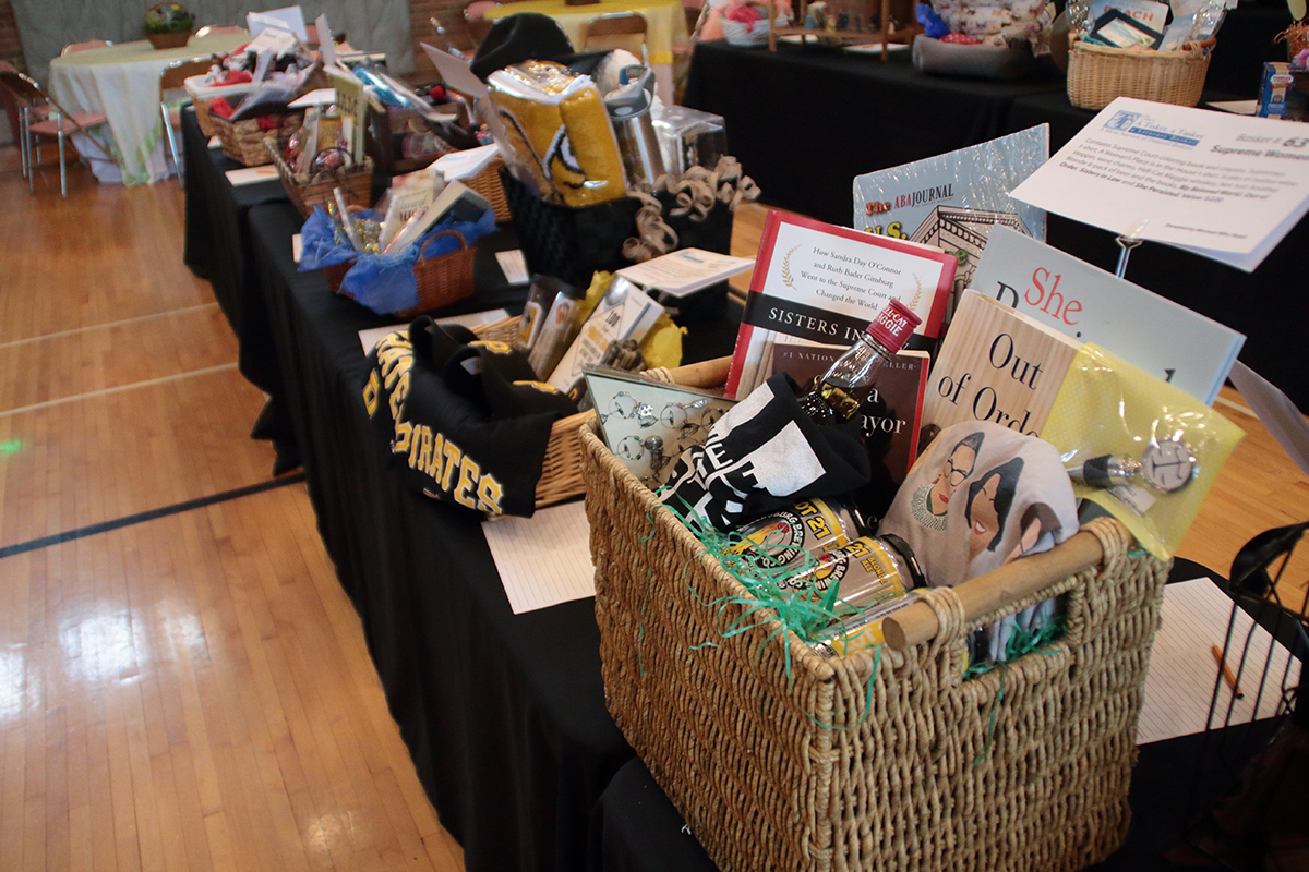 Auction baskets displayed on table