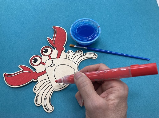 Crab with paints and markers