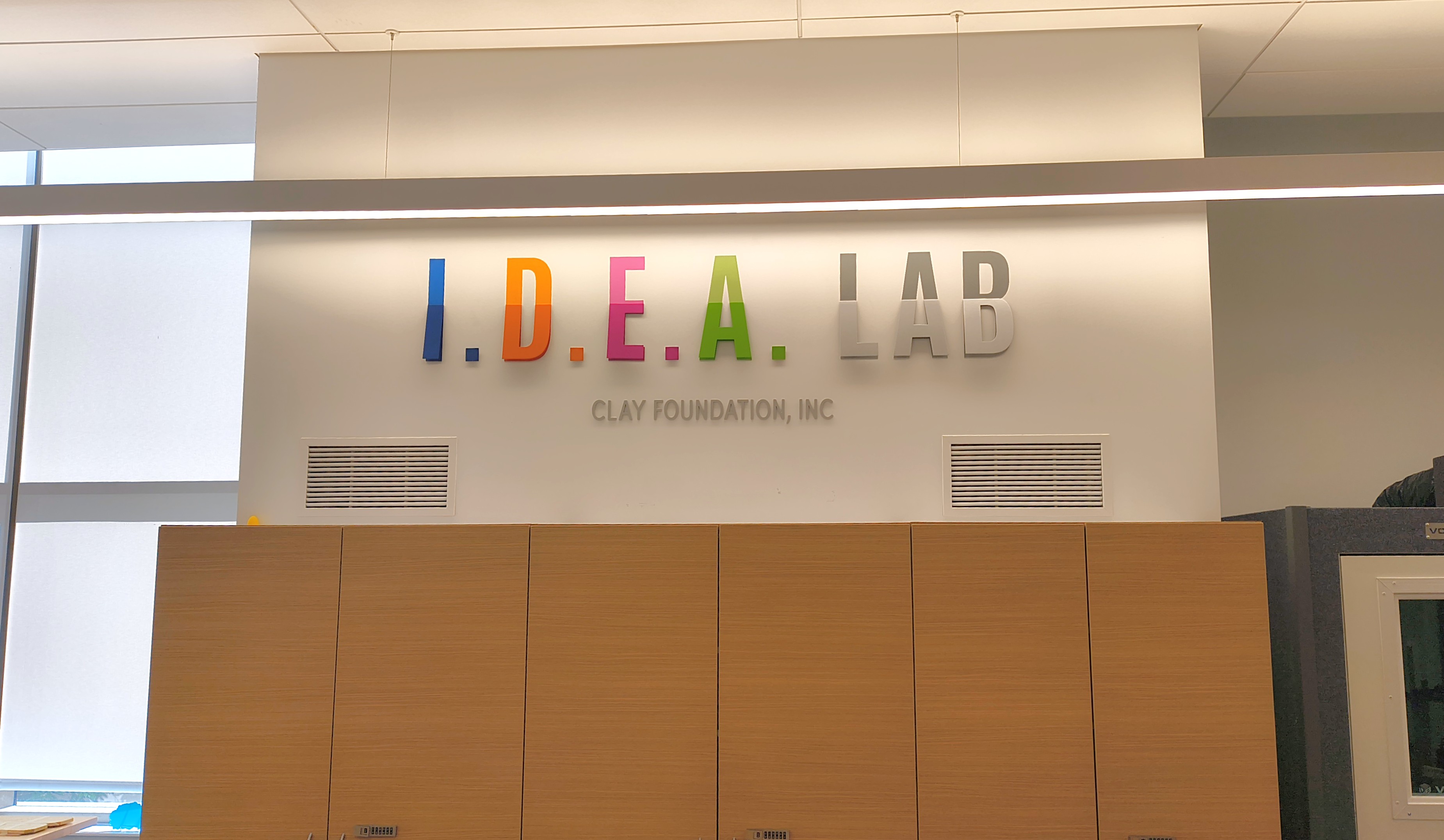 photograph of the IDEA Lab sign inside the library