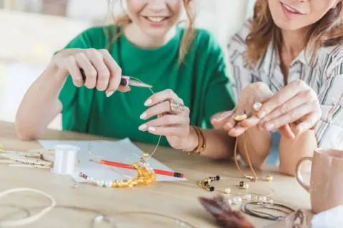 Two People Making Jewelry