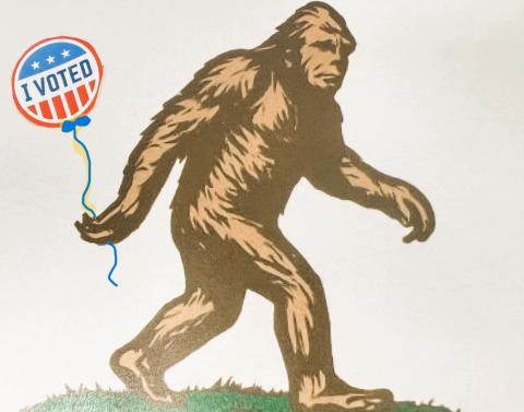 Bigfoot with an I Voted Balloon on a blue string.
