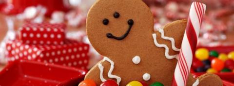 Brown gingerbread man with red and white ornaments