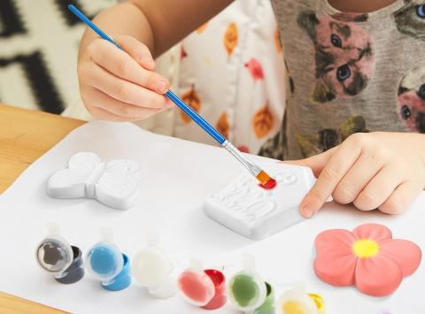 Paintbrush, ceramic flower, paints