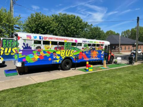 Colorful Painted School Bus with words "Fun Fitness Bus