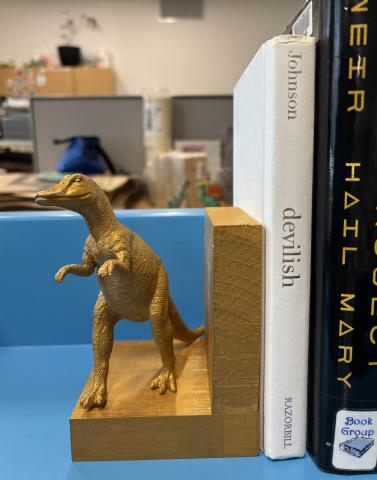 Dinosaur book end painted gold
