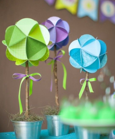 Pot with origami flower made with paper circles