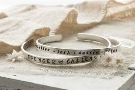 Stamped bracelets on white backdrop