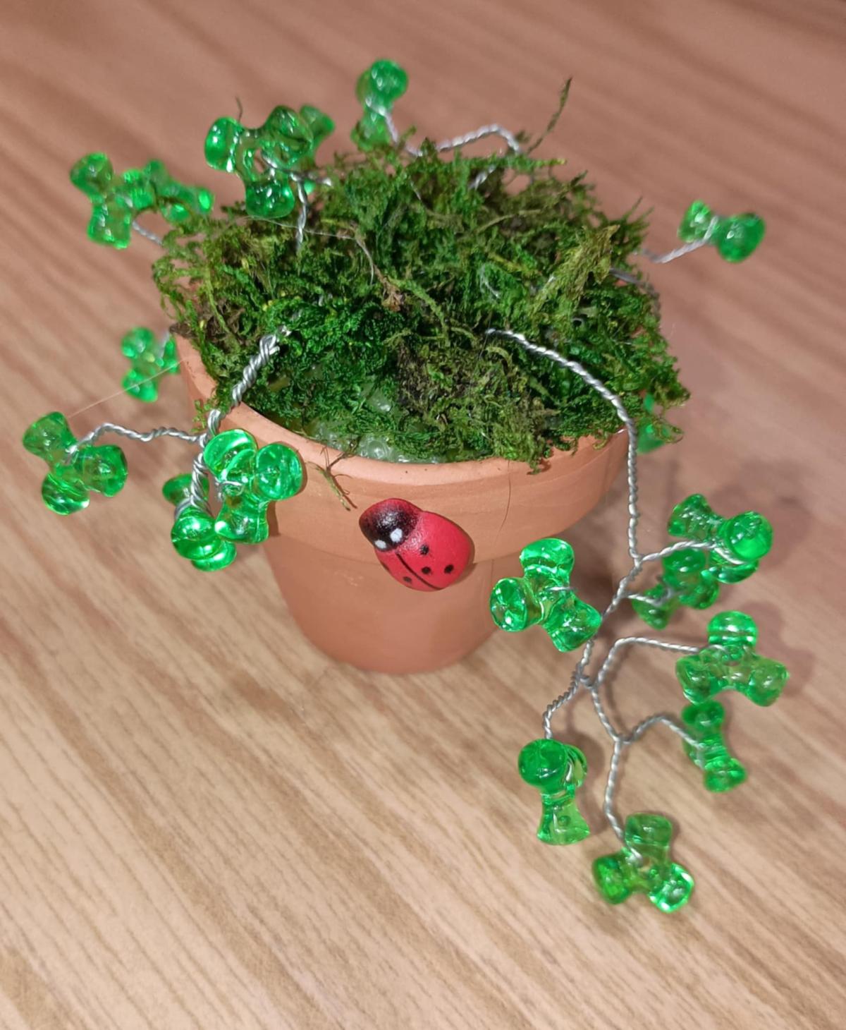 beaded plant with ladybug