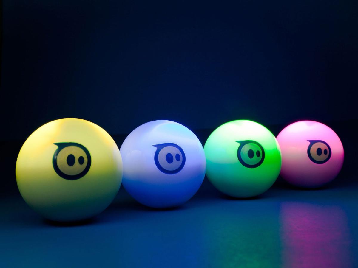 Yellow, blue, green, and pinks spherical bots
