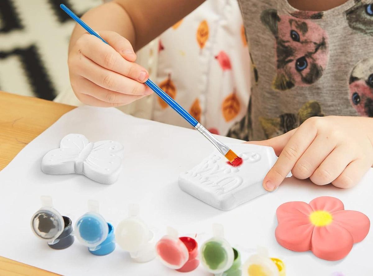 Paintbrush, ceramic flower, paints